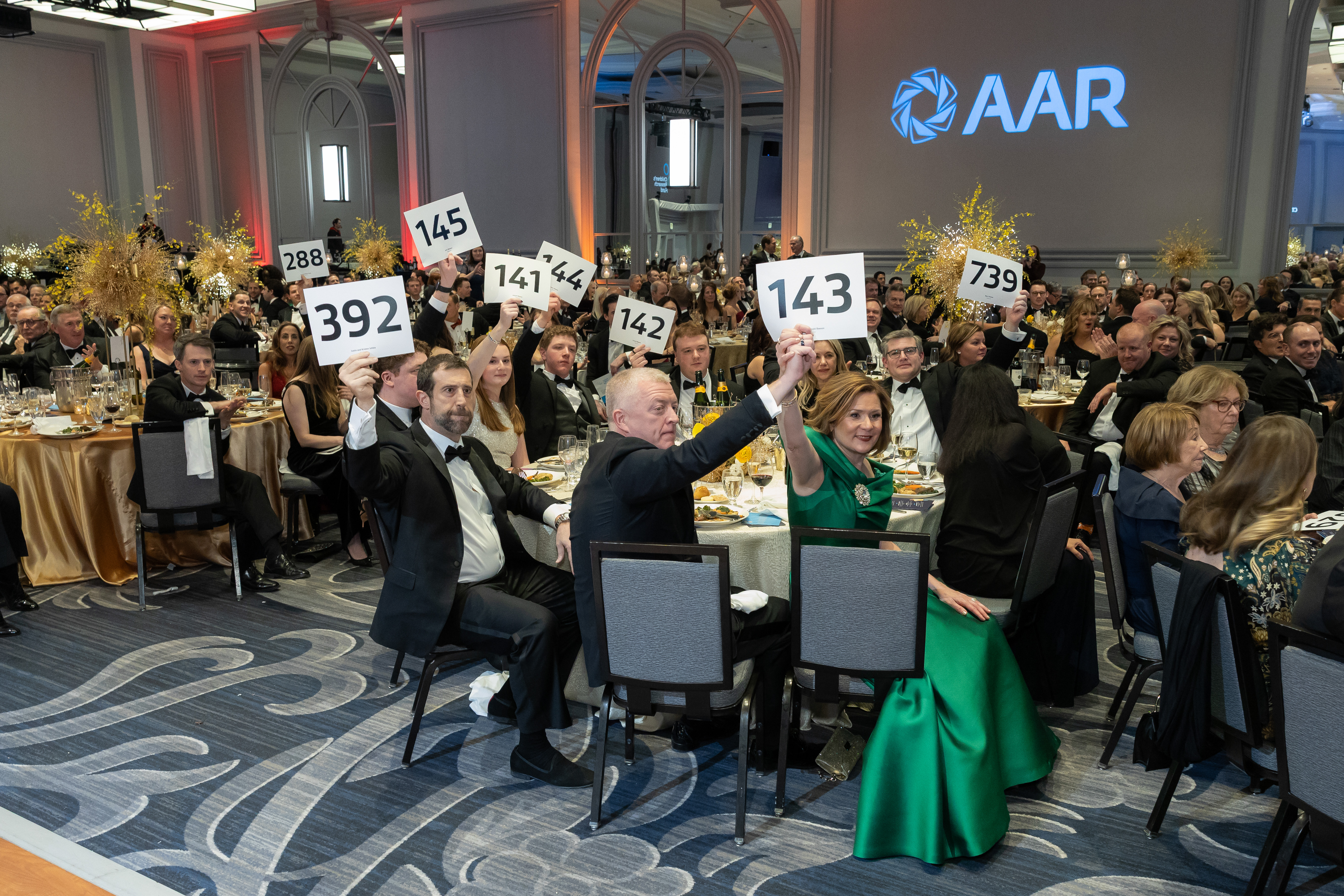 Justin Ishbia with Beeson Family Paddles